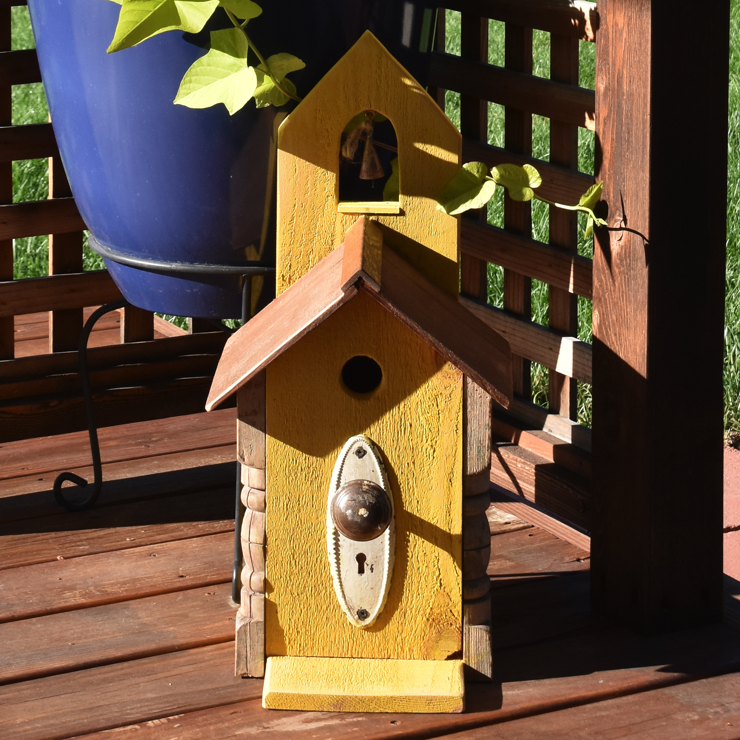 Photo of Yellow Birdhouse with Bells and Antique Knob