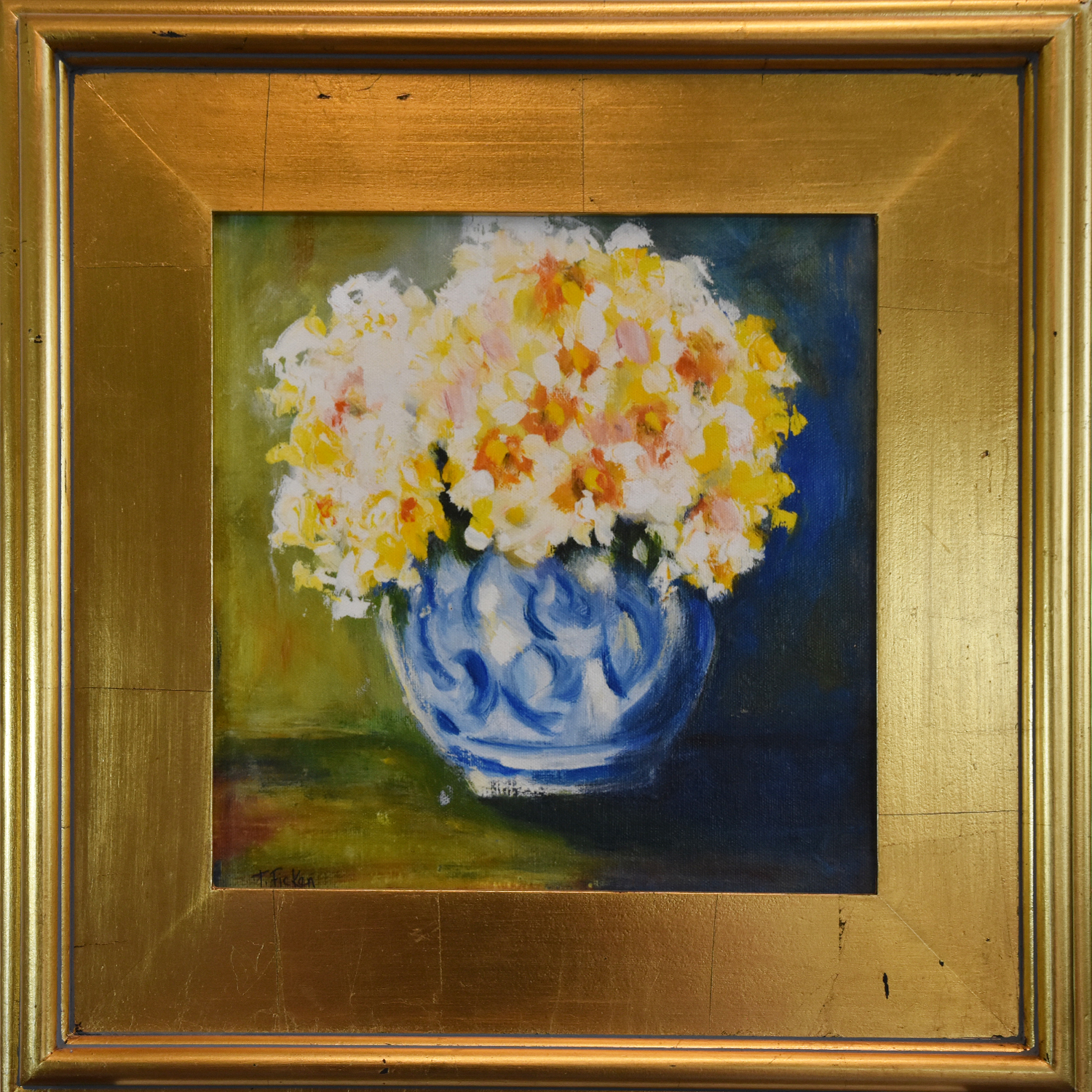 Photo of Daffodiles in Blue Vase